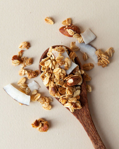 Granola Coconut & Almonds on spoon